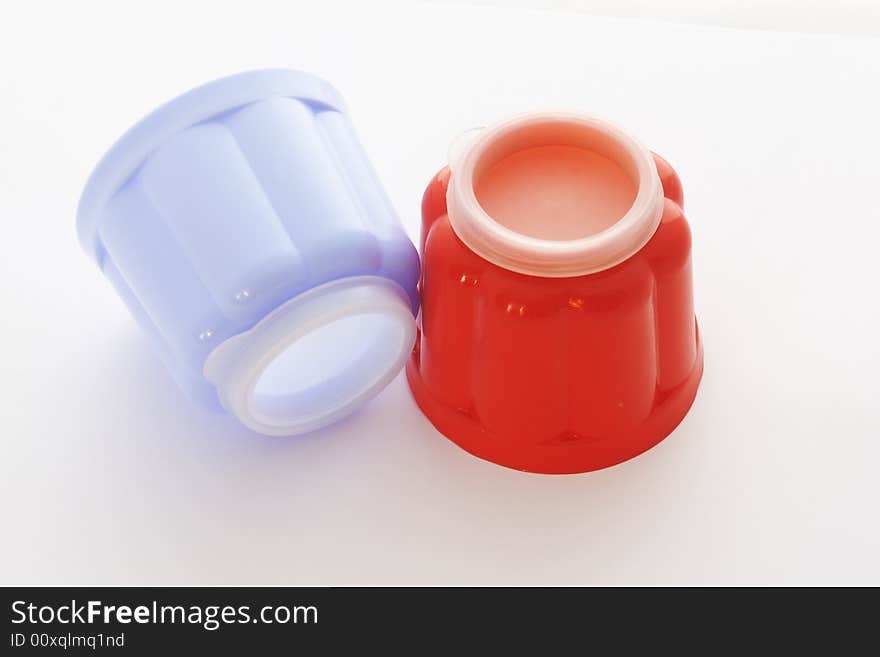 Blue and red jelly moulds for single servings of food