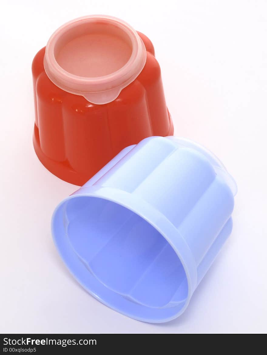 Blue and red jelly moulds for single servings of food