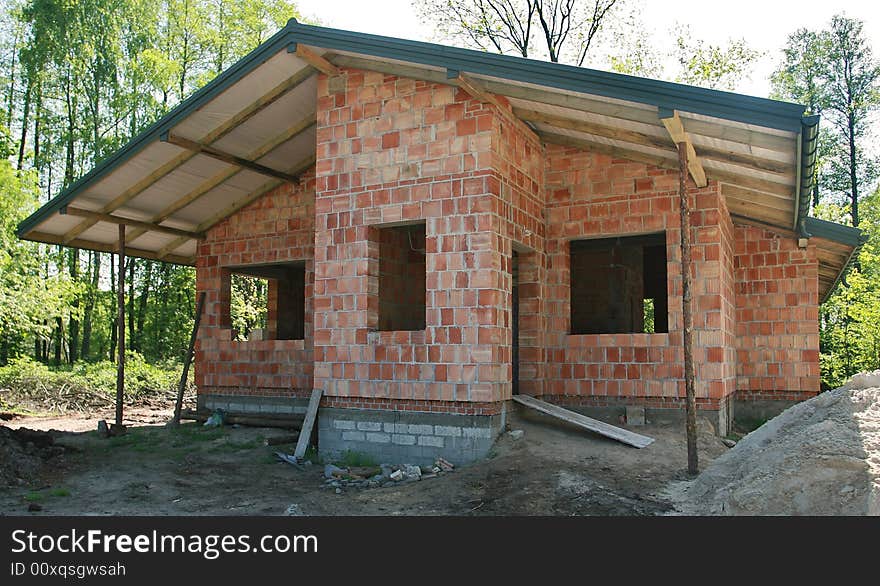 Construction of the single-family home. Construction of the single-family home