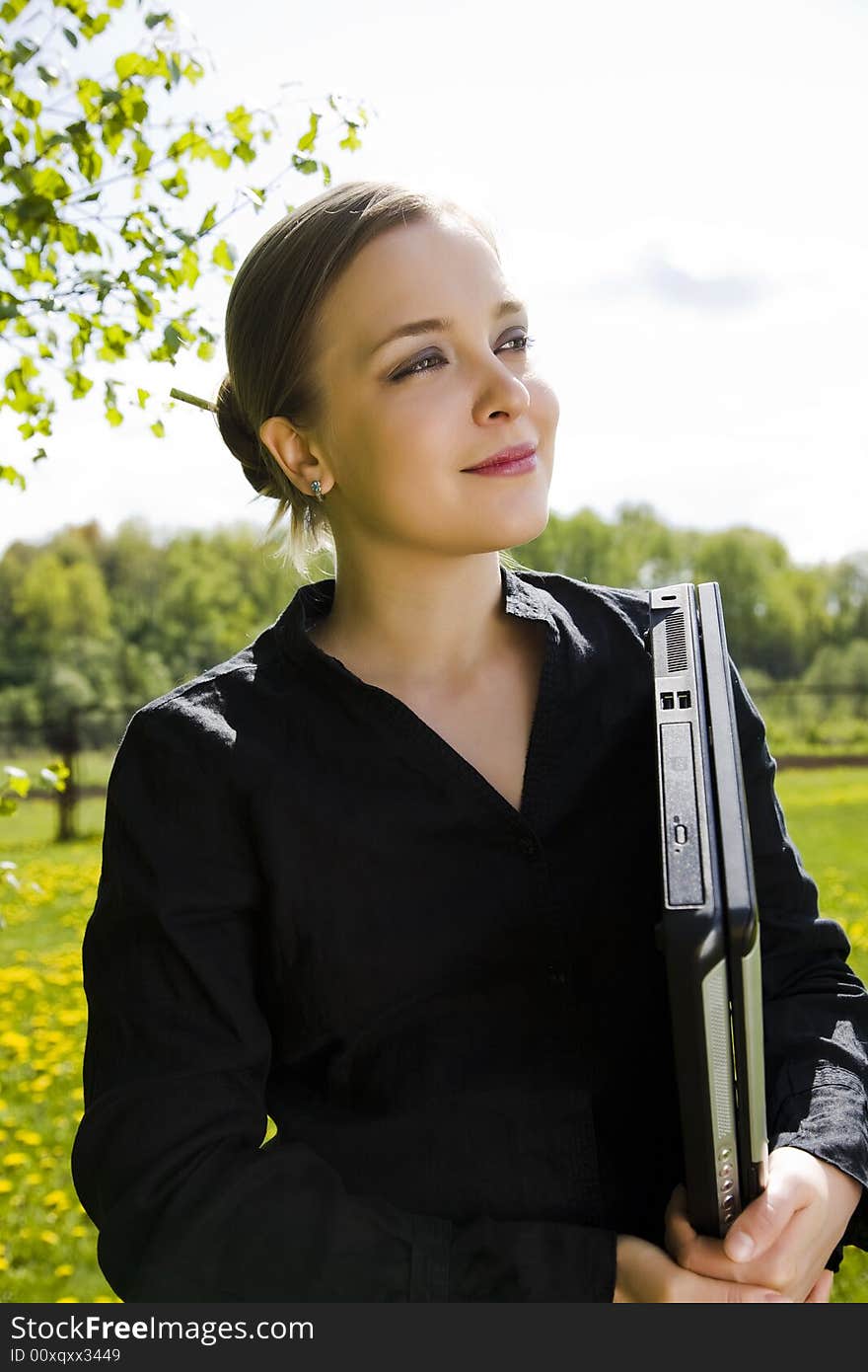 Young Woman With Laptop Computer