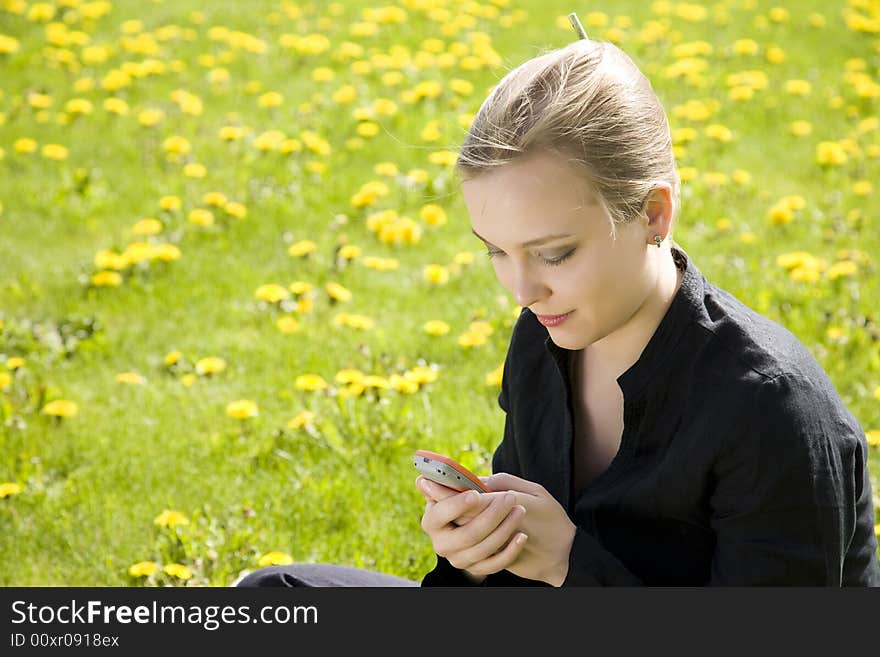 Message. Young Woman With Cell Phone.