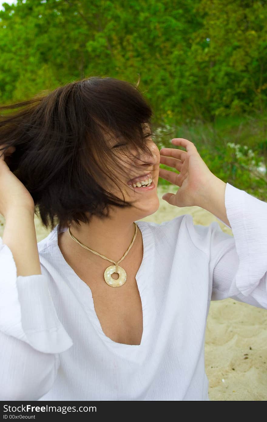 Woman sitting on the beach. Woman sitting on the beach