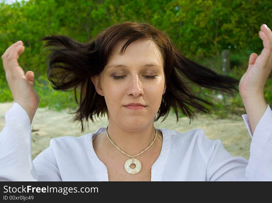 Woman sitting on the beach. Woman sitting on the beach