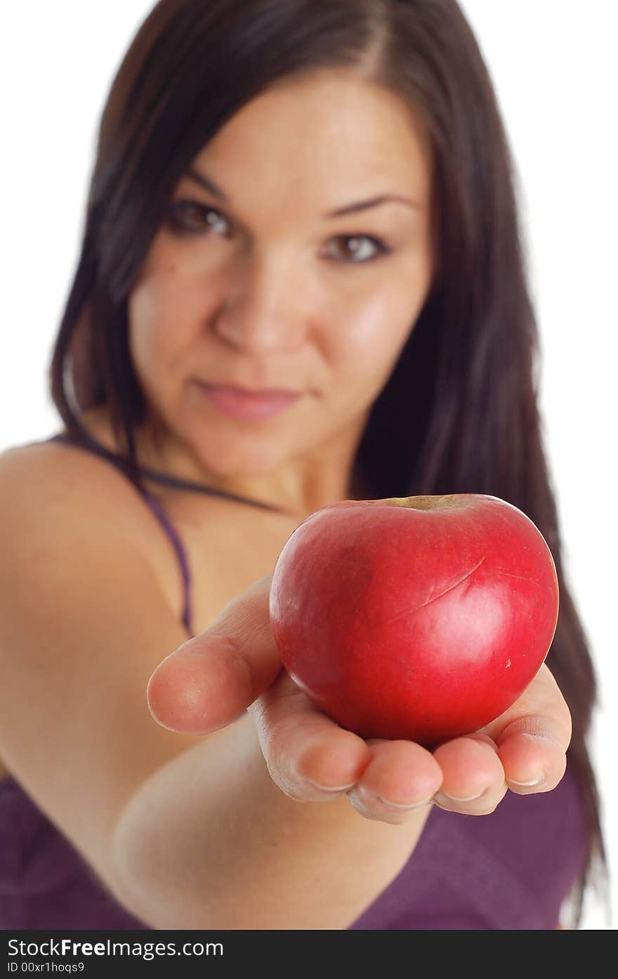 Attractive brunette woman with apple on white background. Attractive brunette woman with apple on white background