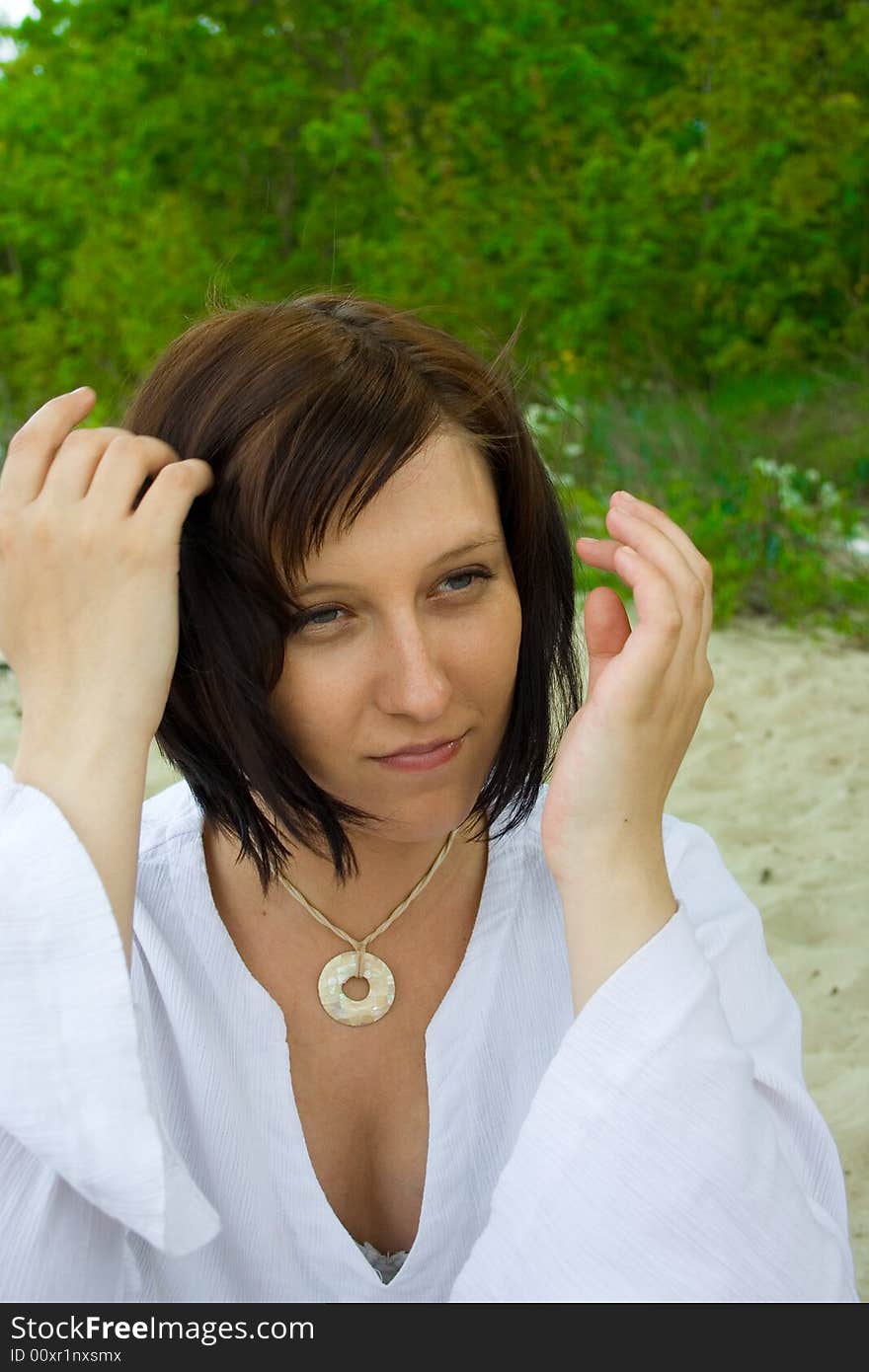 Woman sitting on the beach. Woman sitting on the beach