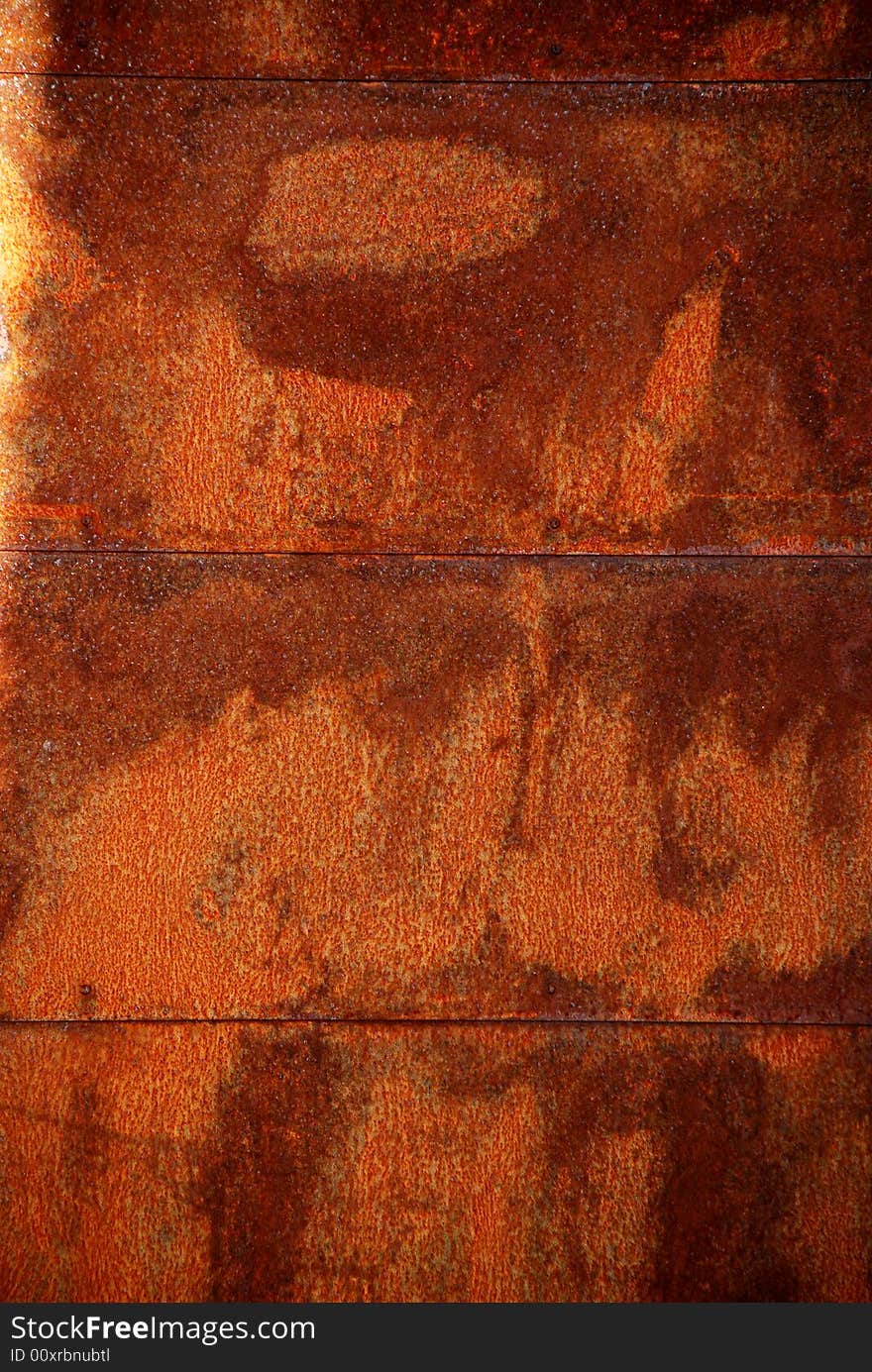 Rusty metal background with brown colours