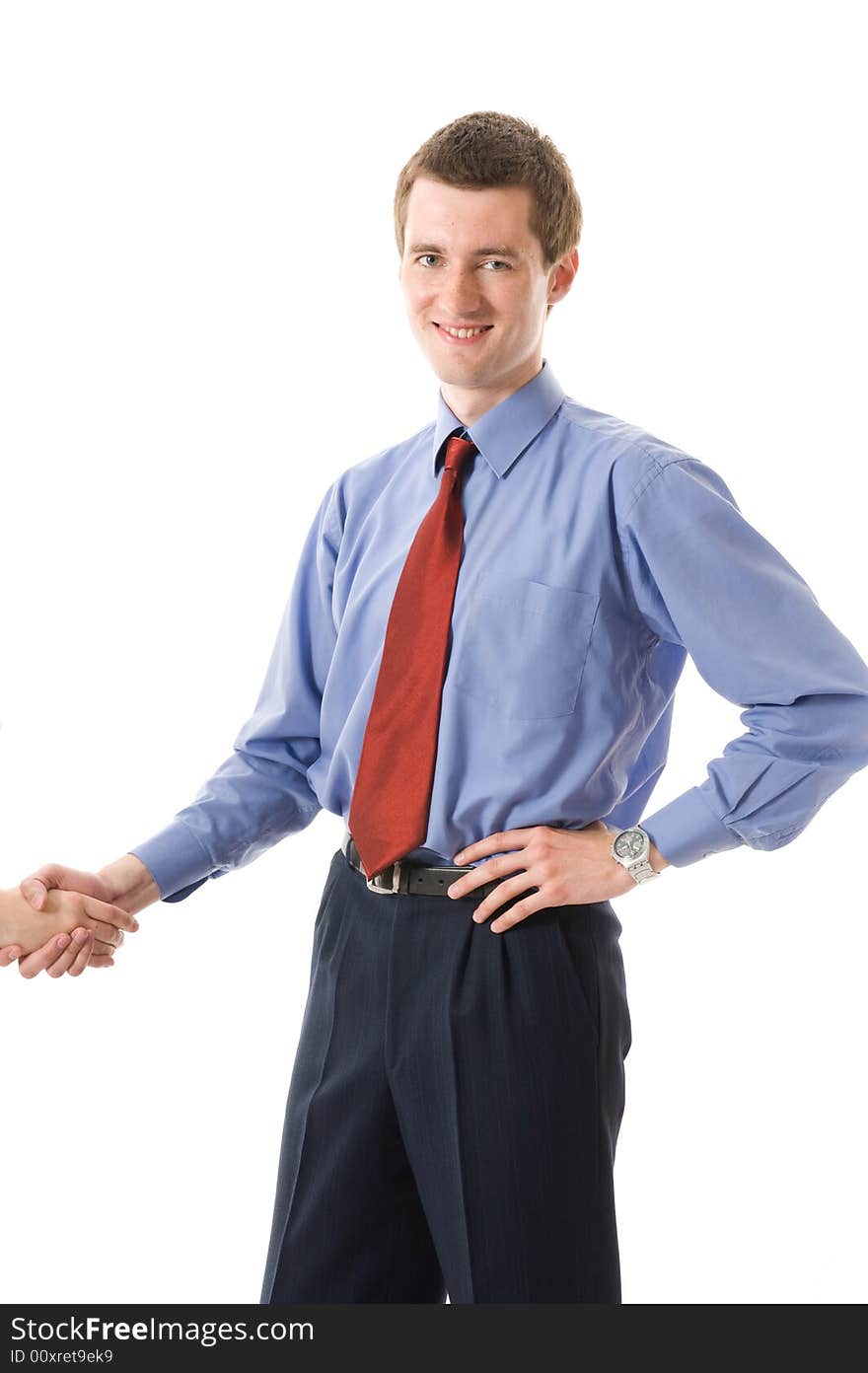 Handshake. Young business man smiling. Isolated on white