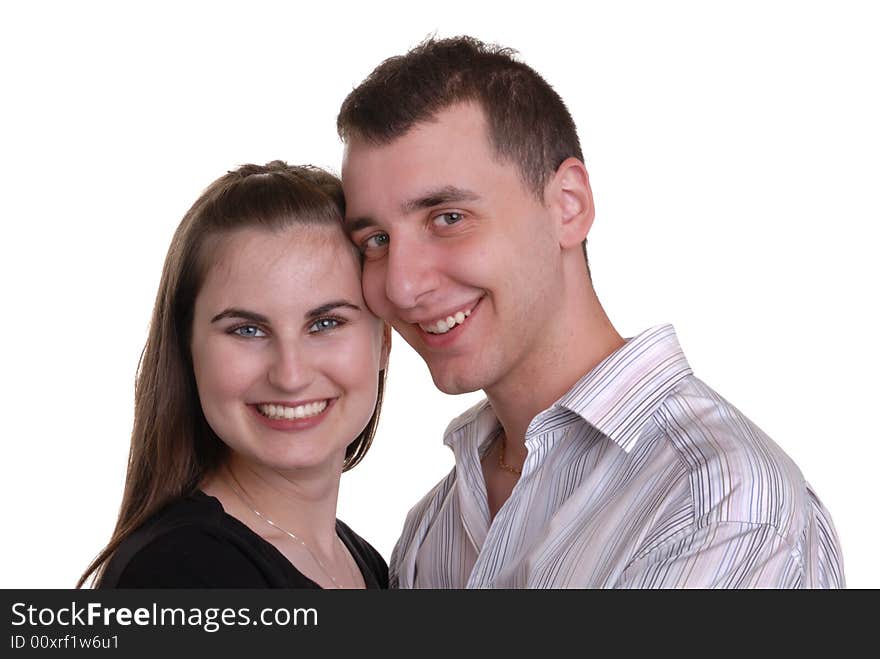 Attractive young couple enjoy an affectionate moment - on white. Attractive young couple enjoy an affectionate moment - on white