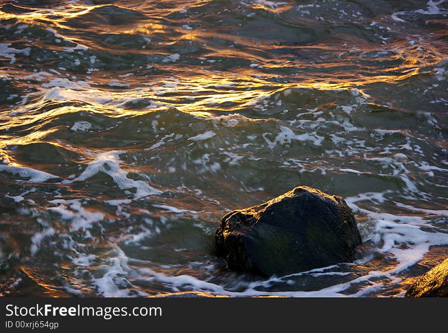 Dramatic colors of waves at the sunset. Dramatic colors of waves at the sunset