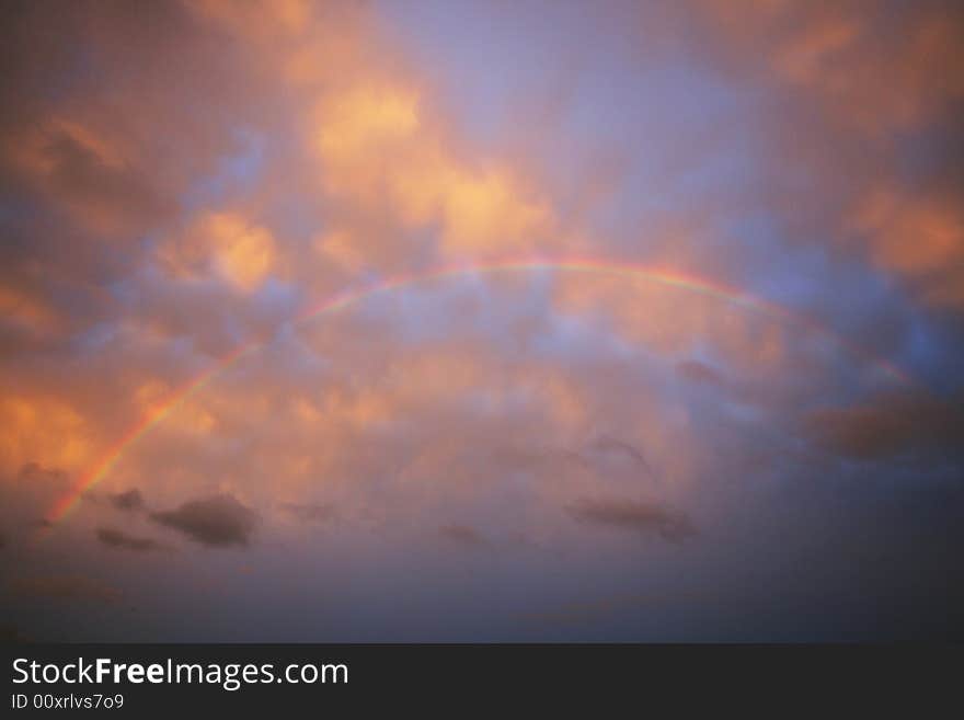 Sunset sky with a rainbow