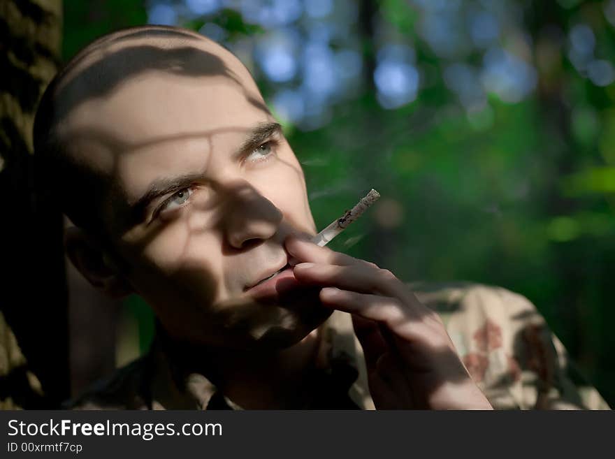 Man and cigarette