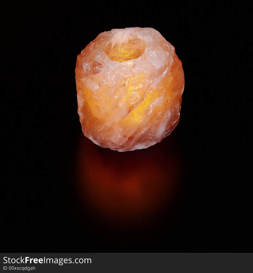 Warm light of the rock salt lamp. Warm light of the rock salt lamp