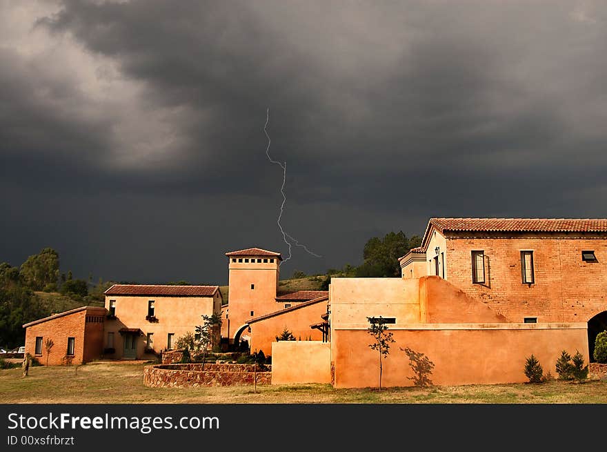 Thunderstorm clouds lightning village sunset