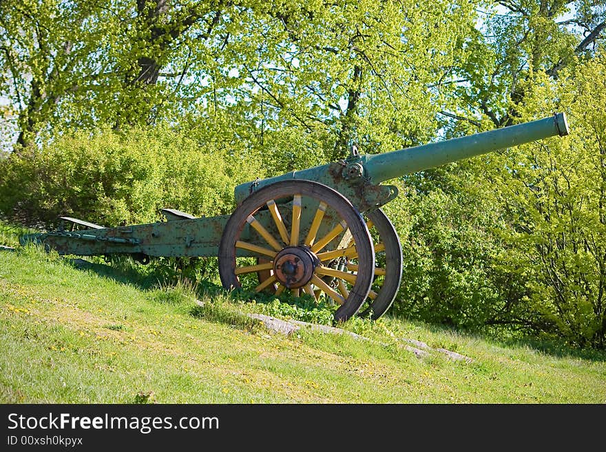 Old war cannon on the field