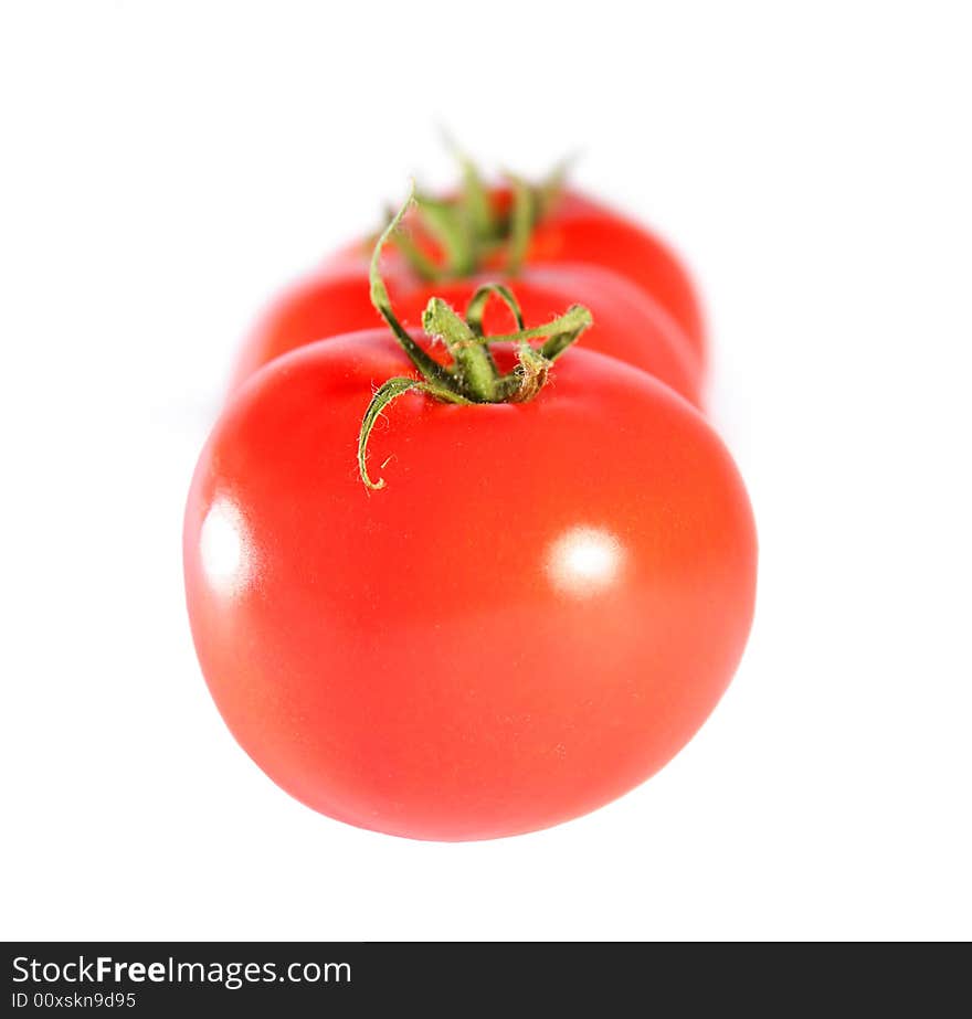 Fresh red tomatoes isolated on white background. Fresh red tomatoes isolated on white background