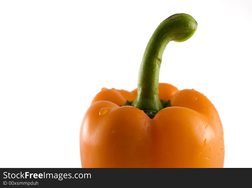 Orange pepper on a white background