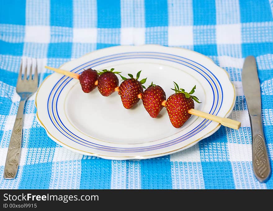 Strawberry barbecue on plate for your design