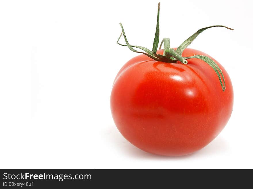Nice fresh isolate tomato over white. Nice fresh isolate tomato over white