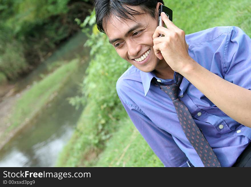 Business man refreshing in nature. Business man refreshing in nature