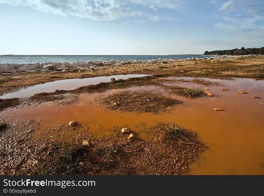 Pond on red dirt