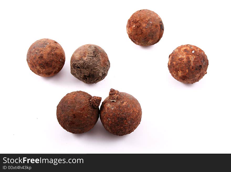 Six rusted balls