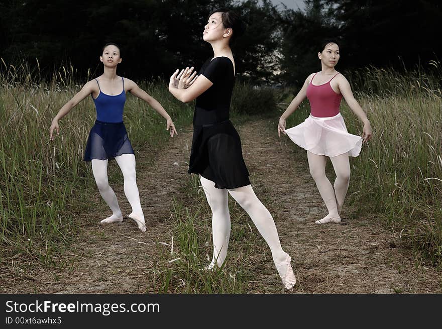 Ballerinas performing in the outdoors. Ballerinas performing in the outdoors