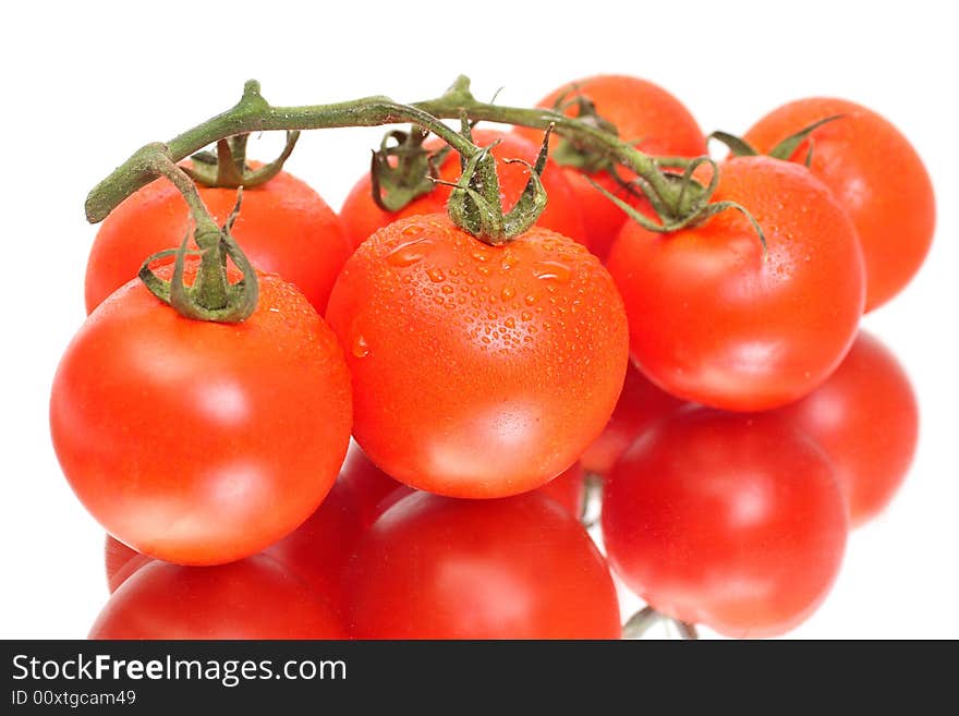 Seven Tomatoes With Reflection