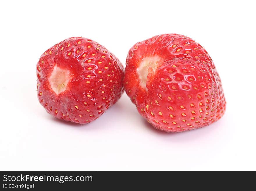 Two sweet strawberry on white background