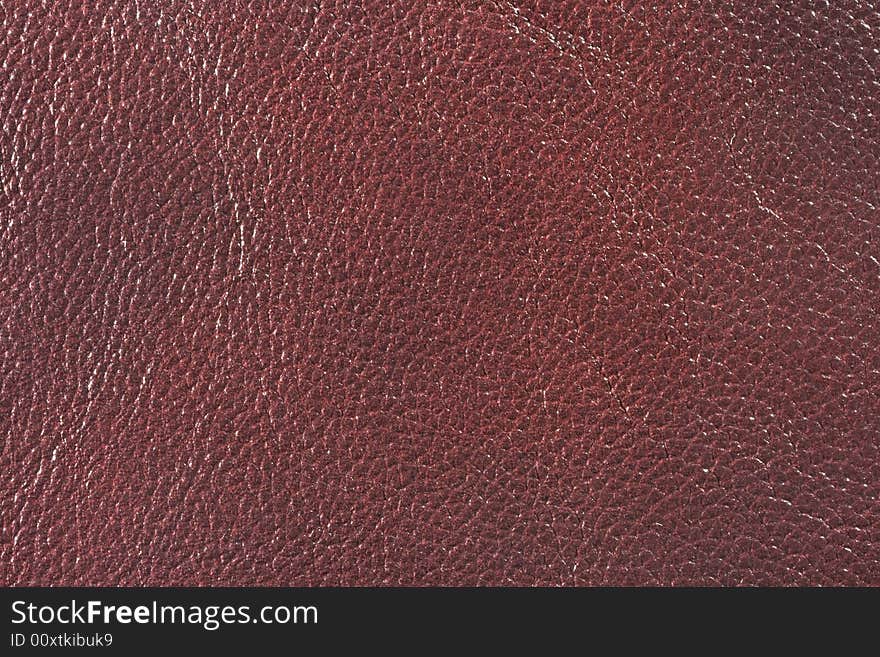 Natural qualitative brown leather texture. Close up. Natural qualitative brown leather texture. Close up.