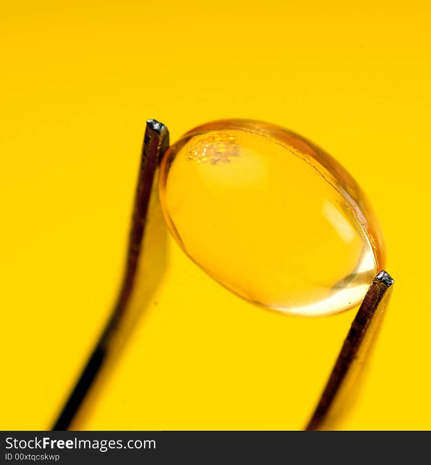 A view with a close up vitamin pills. A view with a close up vitamin pills