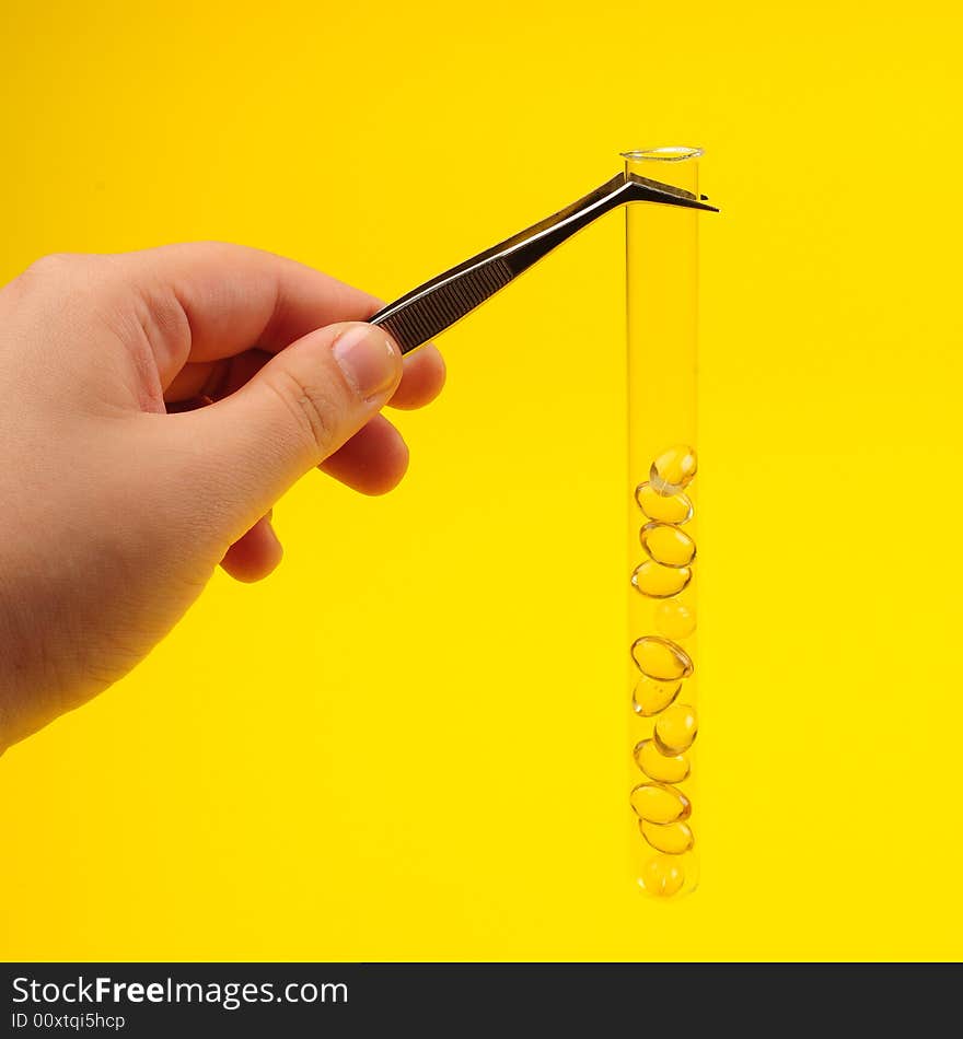 Vitamins development concept. A view with vitamins and test tube