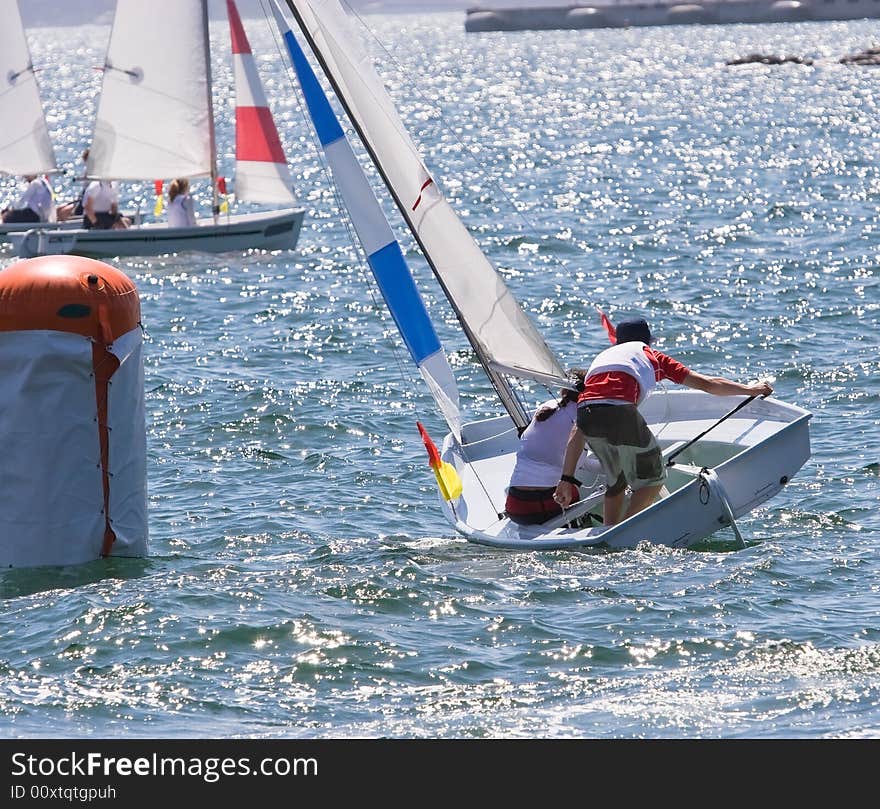 Sailing boats racing on the harbour. Sailing boats racing on the harbour