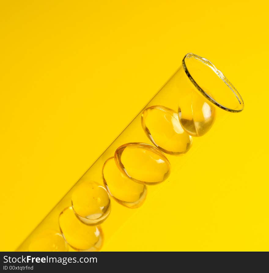 Vitamins development concept. A view with vitamins and test tube