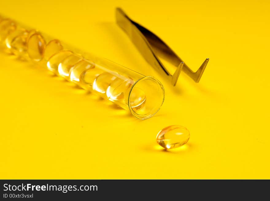 Vitamins development concept. A view with vitamins and test tube