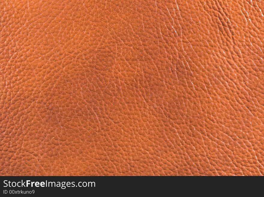 Natural qualitative brown leather texture. Close up. Natural qualitative brown leather texture. Close up.