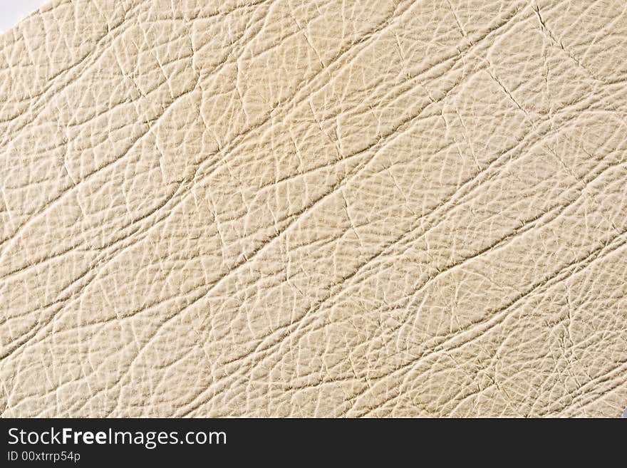 Natural qualitative beige leather texture. Close up. Natural qualitative beige leather texture. Close up.