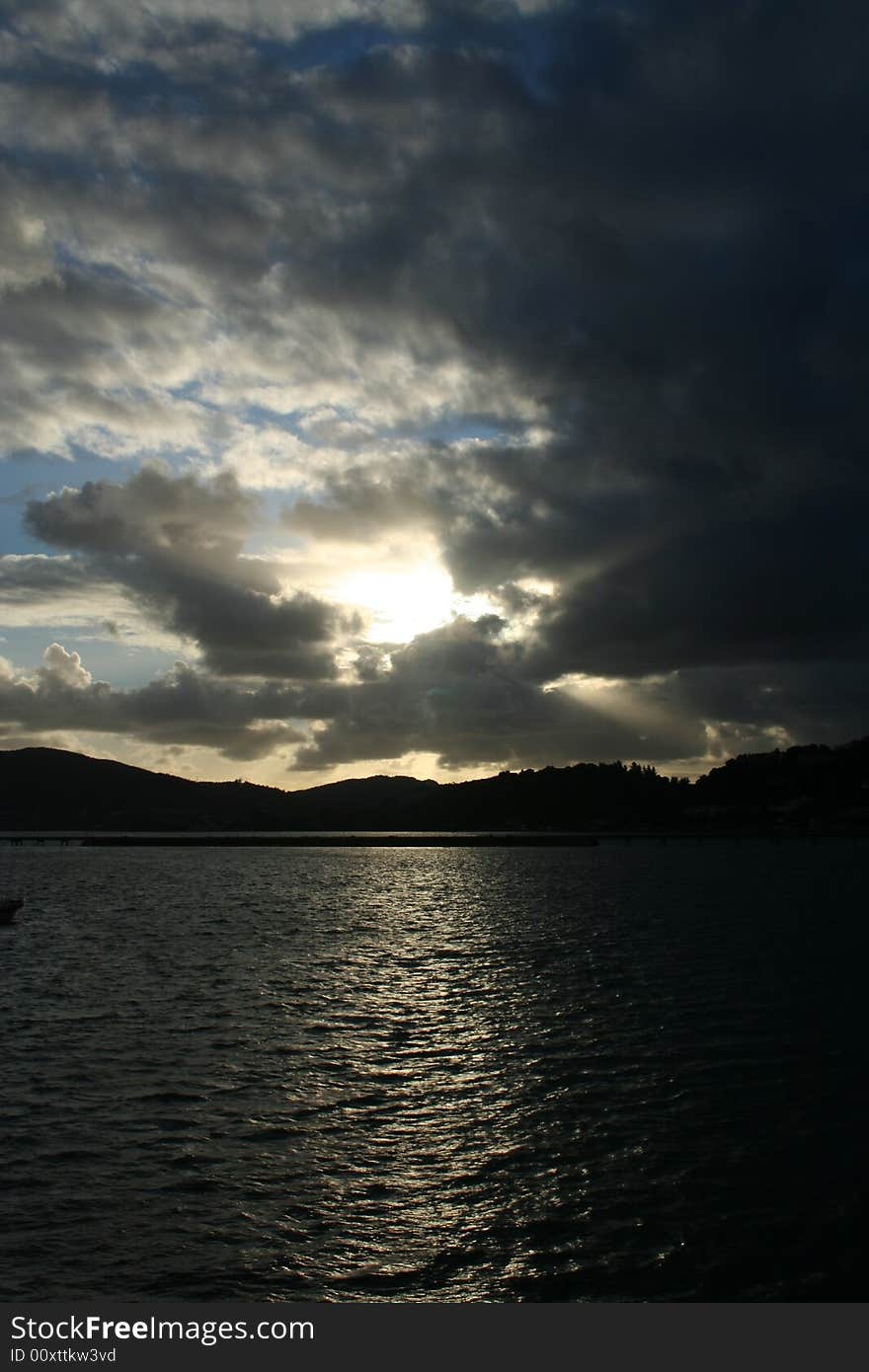 Sunset on the Knysna Lagoon taken from the centre of the lagoon. Sunset on the Knysna Lagoon taken from the centre of the lagoon