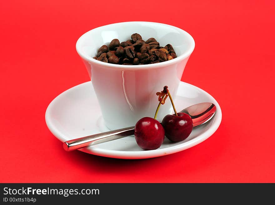 Macro studio shot of a cup of coffee beans.