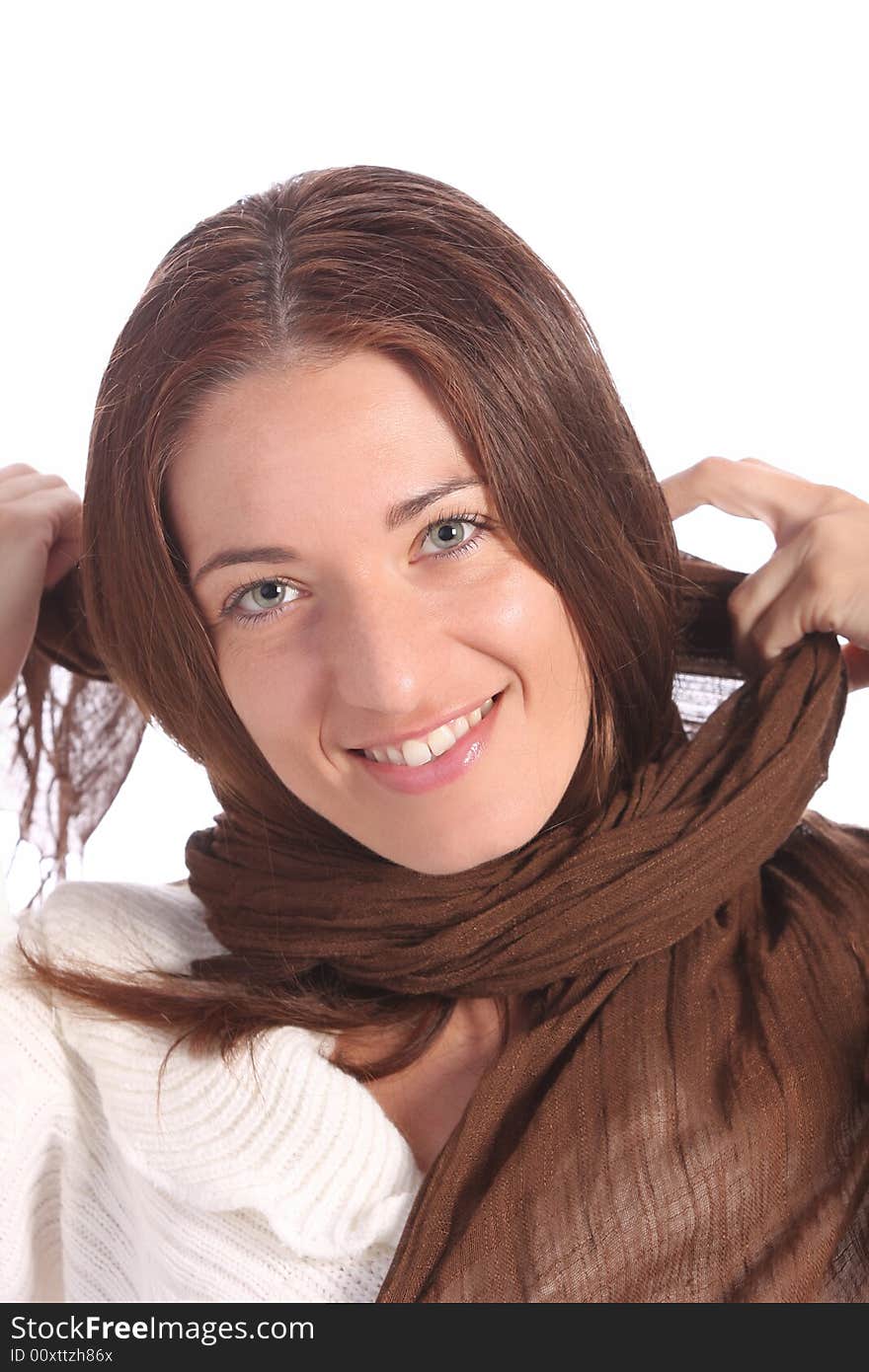 Beautiful young a woman with brown scarf on white background