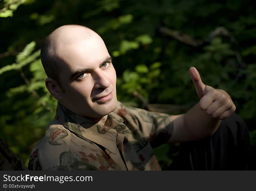 Young  Man Giving Thumbs Up Sign. Young  Man Giving Thumbs Up Sign