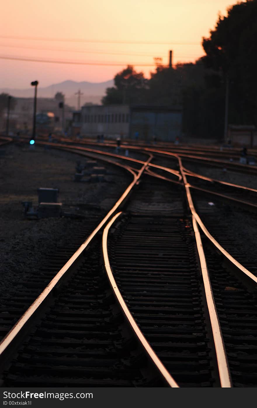 Beautuful scene of railroad in dusk, with the burning clouds. Beautuful scene of railroad in dusk, with the burning clouds.