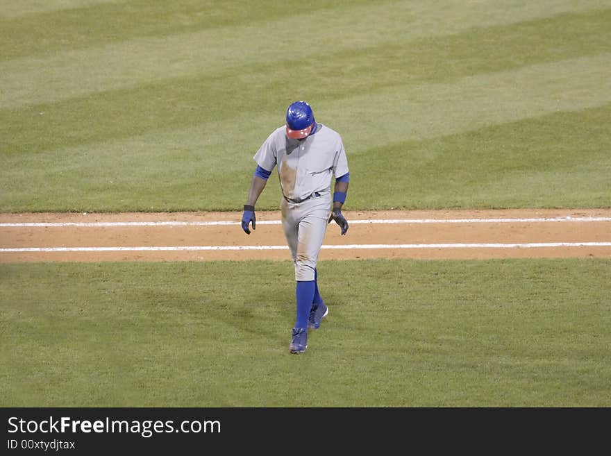 Sports Athlete walking on field. Sports Athlete walking on field