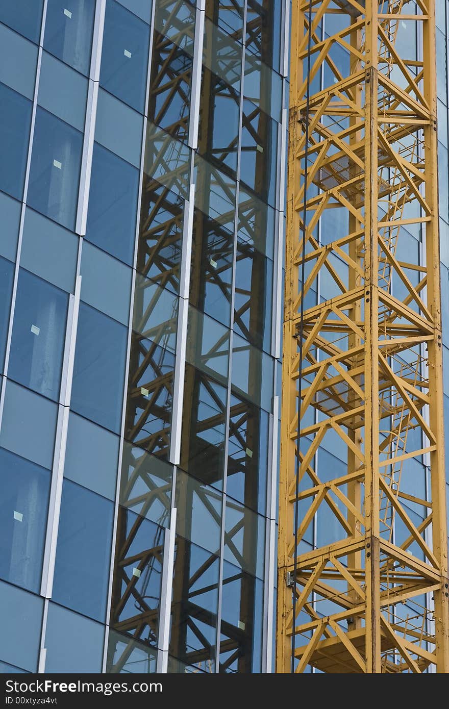 Construction and crane in a modern downtown area. Construction and crane in a modern downtown area