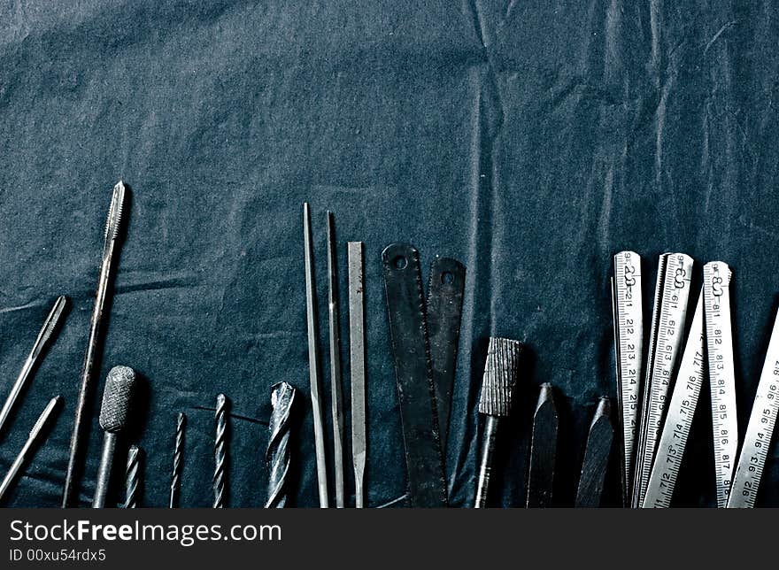 Grunge tools on black background