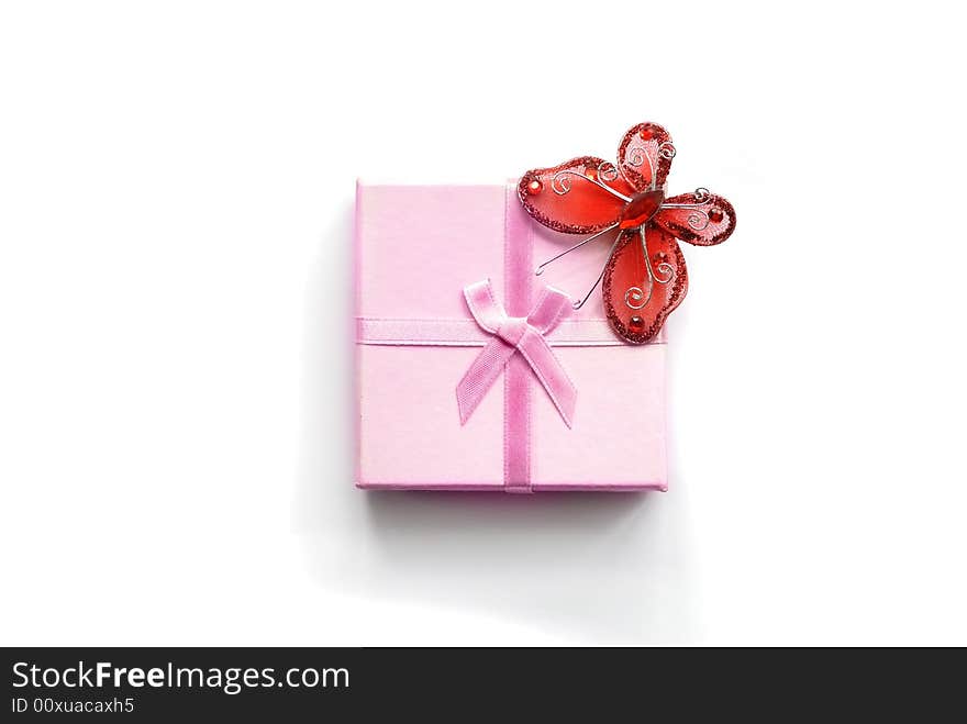 Gift with butterfly isolated on white background