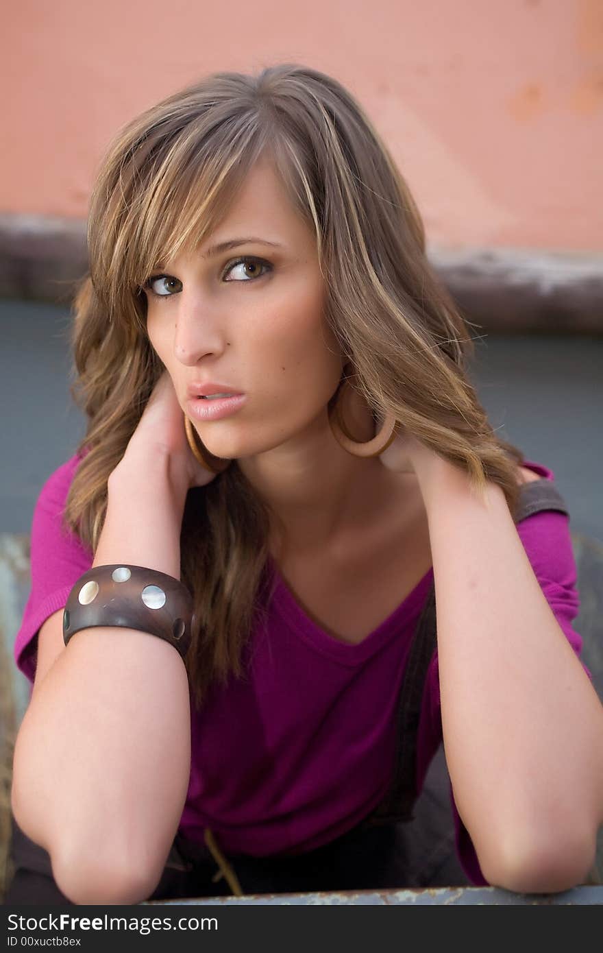 Sexy brunette women portraiture with purple shirt. Sexy brunette women portraiture with purple shirt