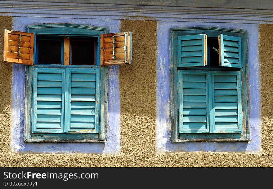 Old windows on stone house