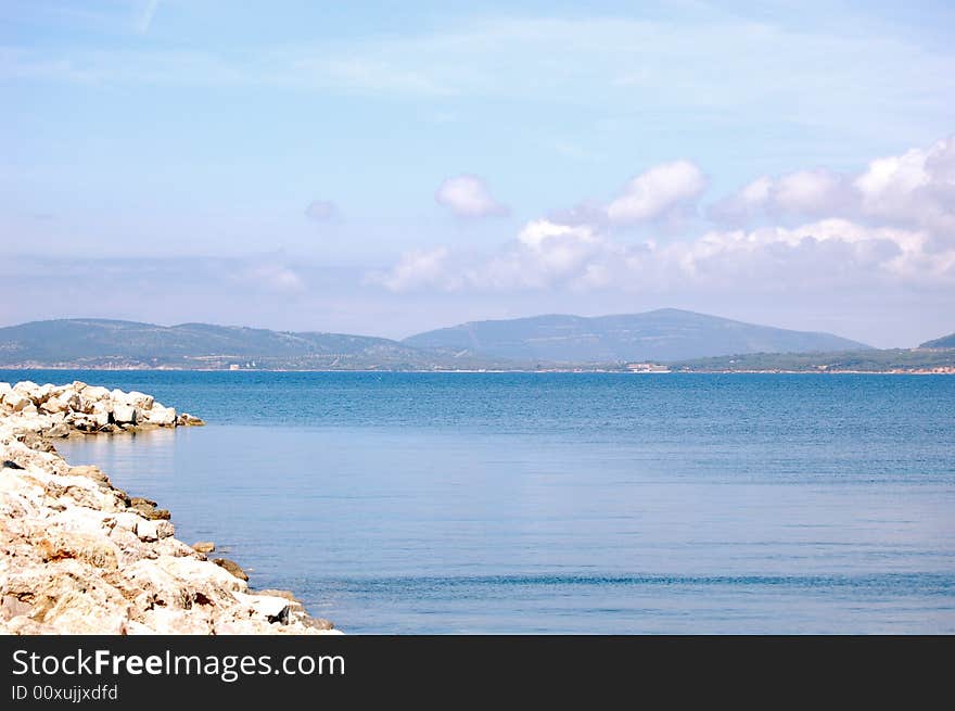 Calm waters off the coast of Alghero, Sardinia.