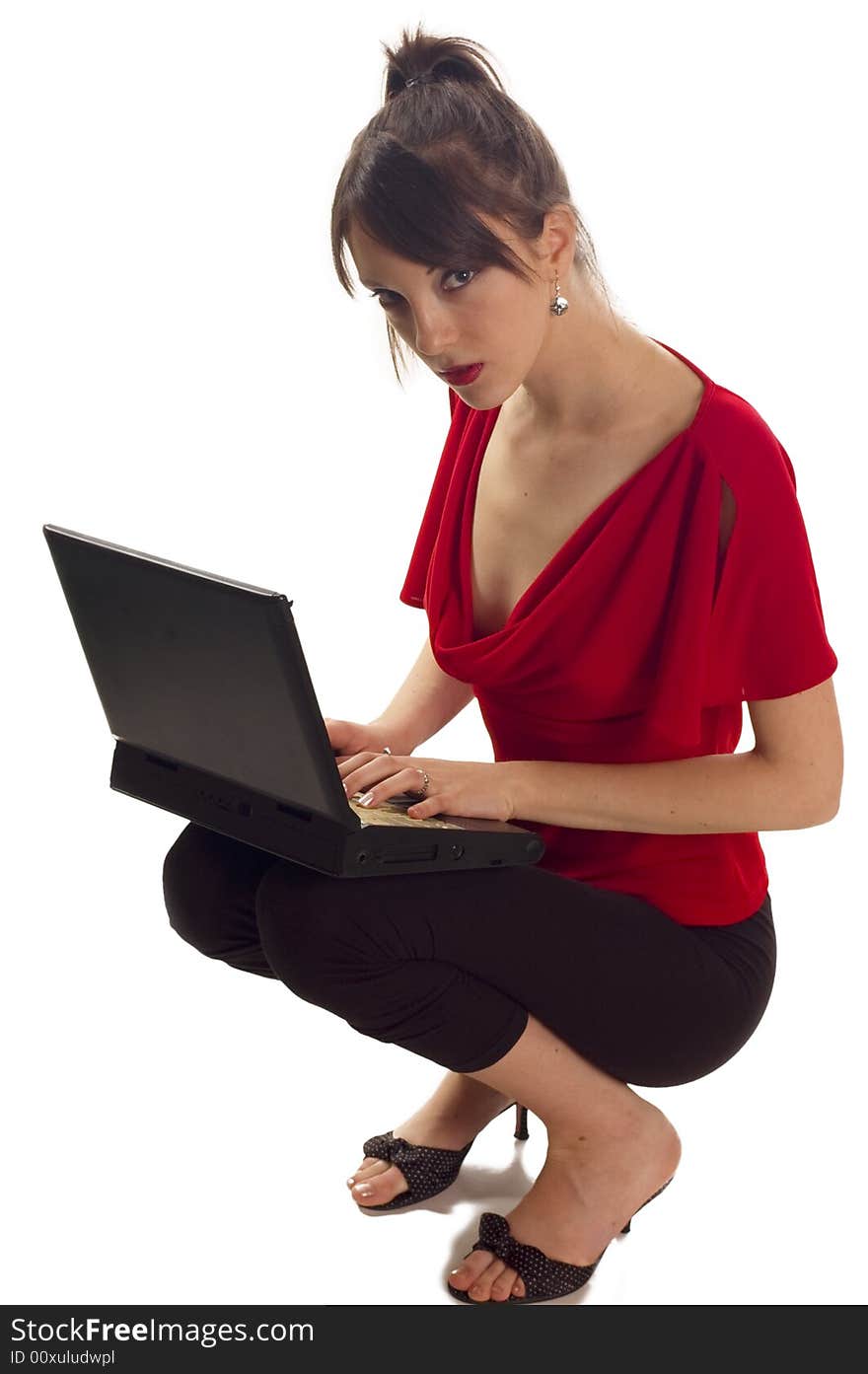 Young pretty woman with laptop on white backgrounds. Young pretty woman with laptop on white backgrounds