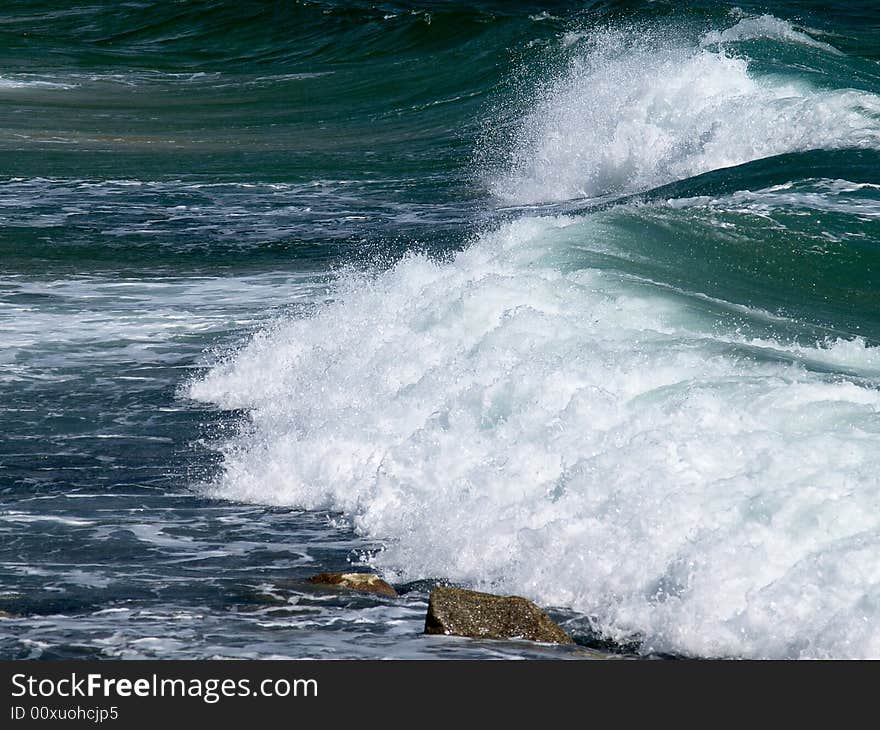 Big surf wave on the sea beach